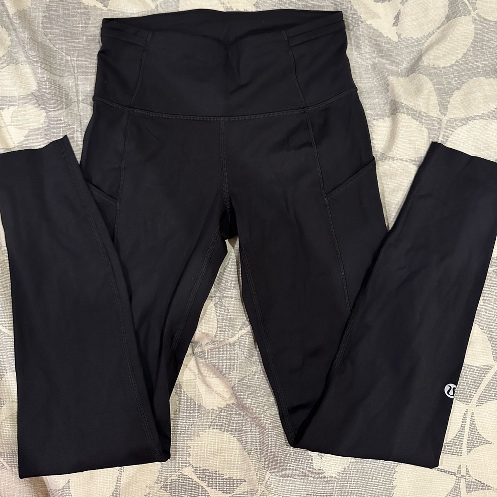 Lululemon black leggings - with pockets- size 4